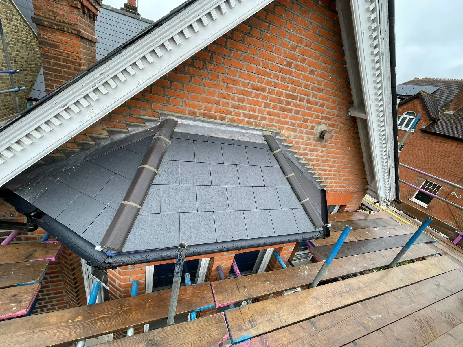 Conservatory roof finished in slate, seen from the scaffold